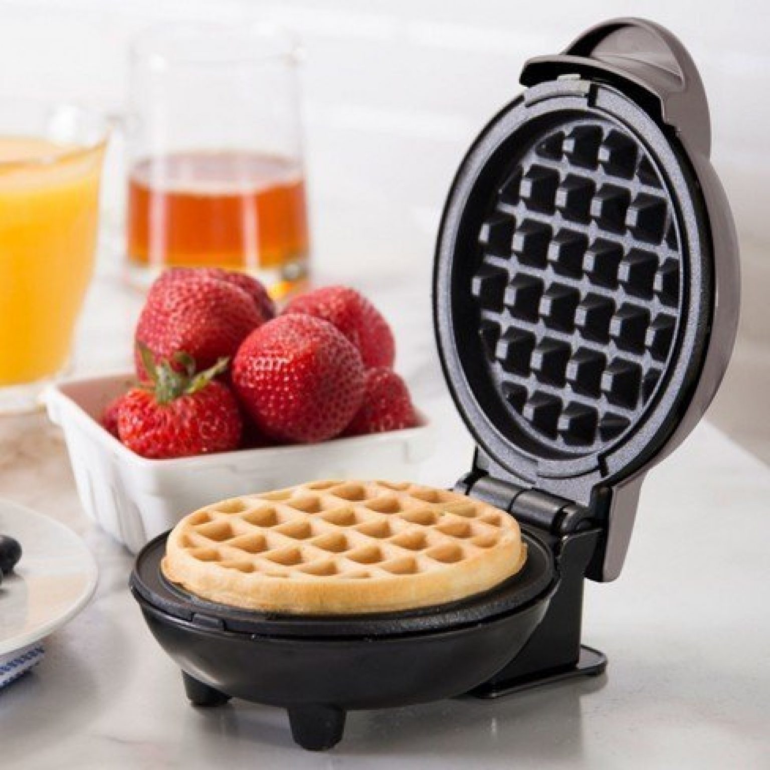 Dash Mini Waffle Maker With A NonStick Surface That’s Simple To Clean